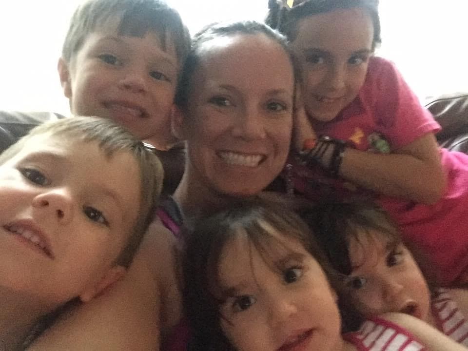 Meg Miller and her five children in a candid family photo