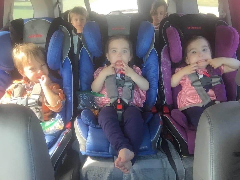 Five children in five car seats